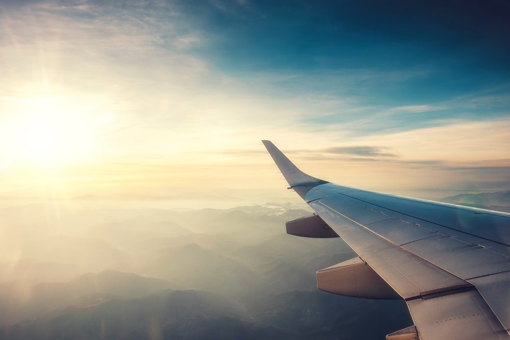 View of the airport and airplane wing from the Inside